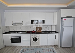 Квартира планировки 1+1 в современном комплексе Махмутлара