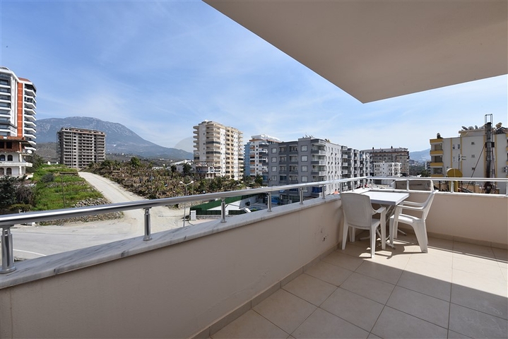 Меблированная квартира планировки 3+1 в Махмутларе