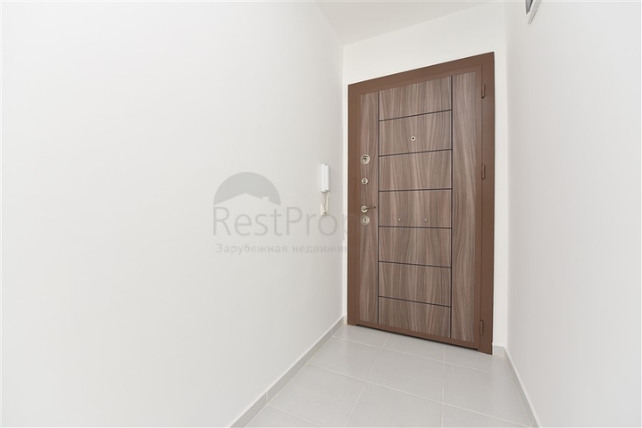 Двухкомнатная квартира в районе Махмутлар по привлекательной цене