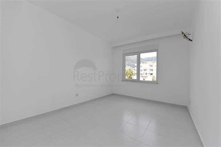 Двухкомнатная квартира в районе Махмутлар по привлекательной цене