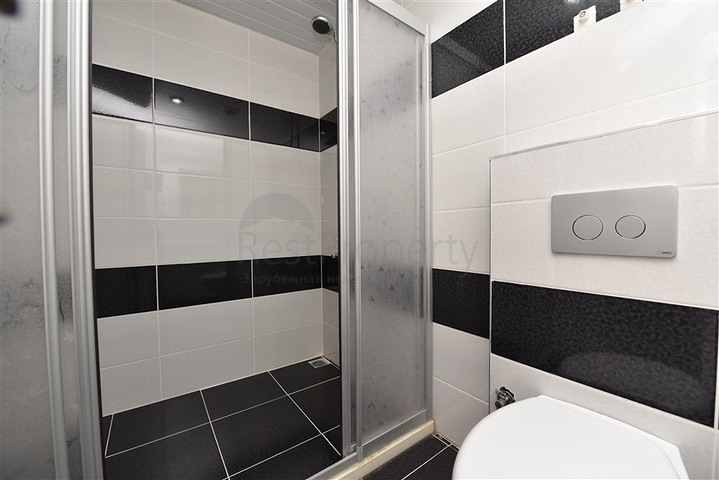 Двухкомнатная квартира в районе Махмутлар по привлекательной цене