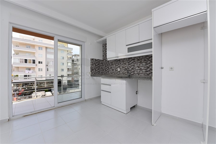 Двухкомнатная квартира в районе Махмутлар по привлекательной цене