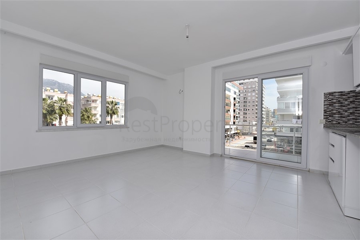 Двухкомнатная квартира в районе Махмутлар по привлекательной цене