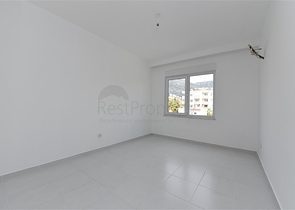 Двухкомнатная квартира в районе Махмутлар по привлекательной цене