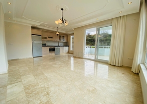 Просторная трехкомнатная квартира в Махмутларе