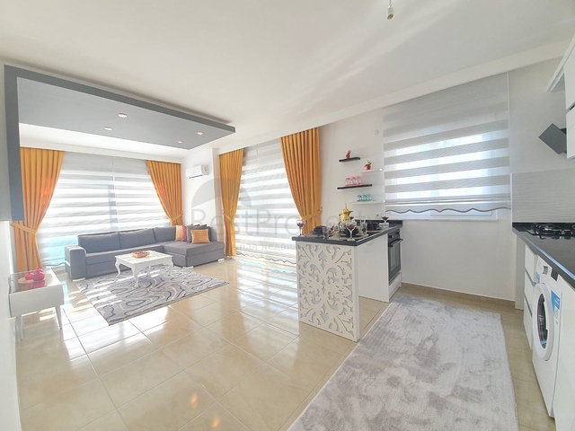 Меблированная квартира планировкой 1+1  в районе Махмутлар