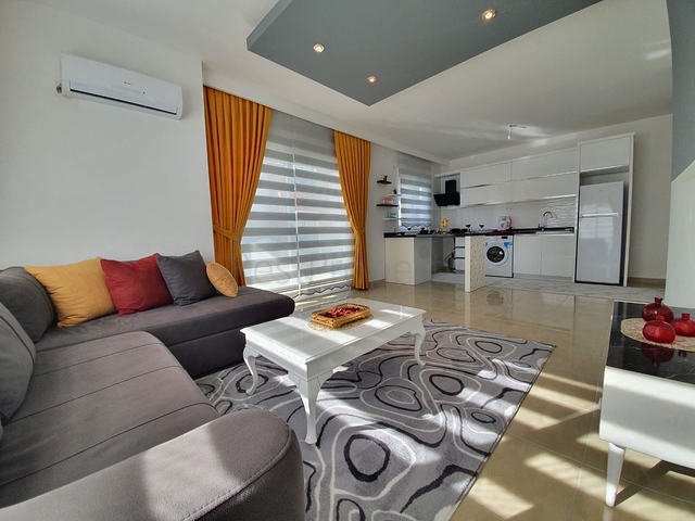 Меблированная квартира планировкой 1+1  в районе Махмутлар