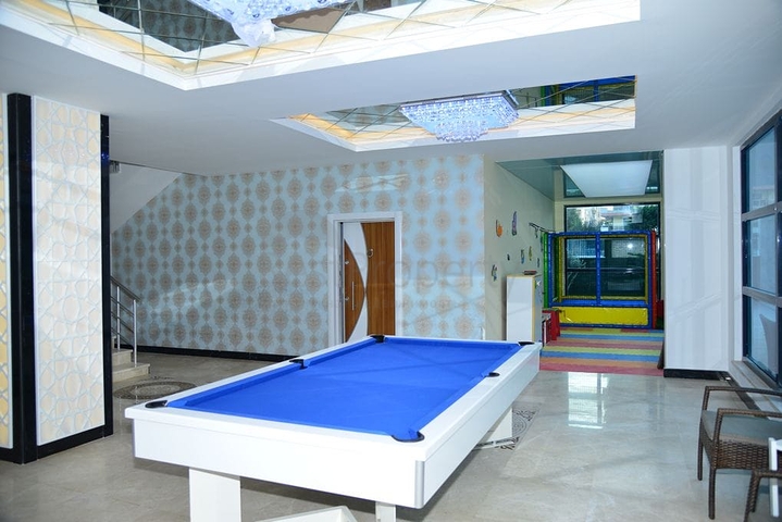 Меблированная квартира планировкой 1+1  в районе Махмутлар