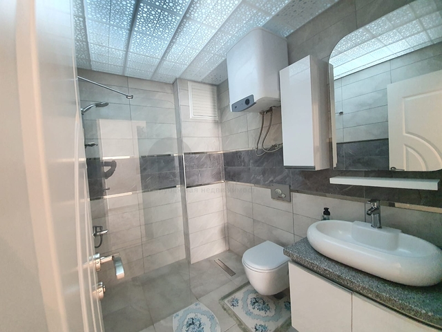 Меблированная квартира планировкой 1+1  в районе Махмутлар