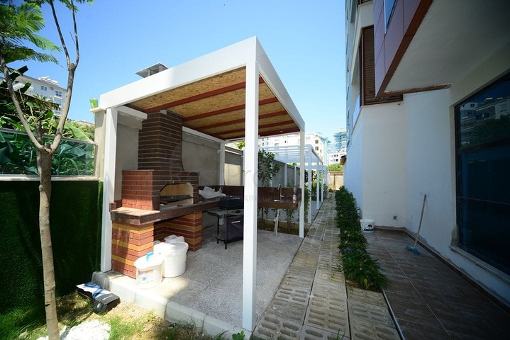 Меблированная квартира планировкой 1+1  в районе Махмутлар