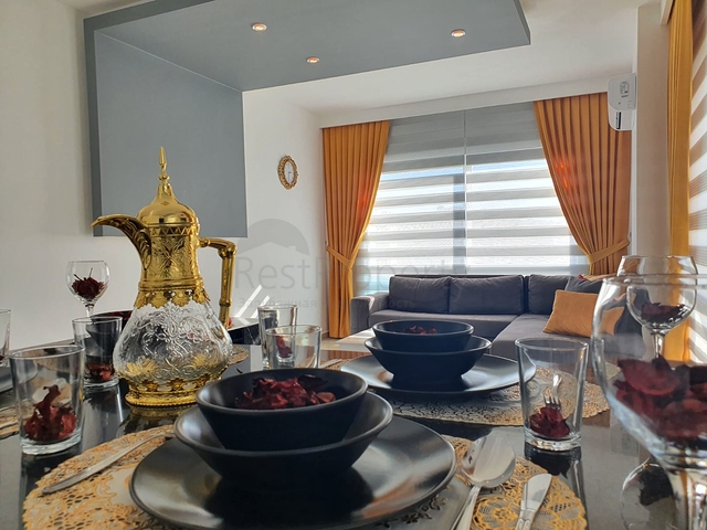 Меблированная квартира планировкой 1+1  в районе Махмутлар