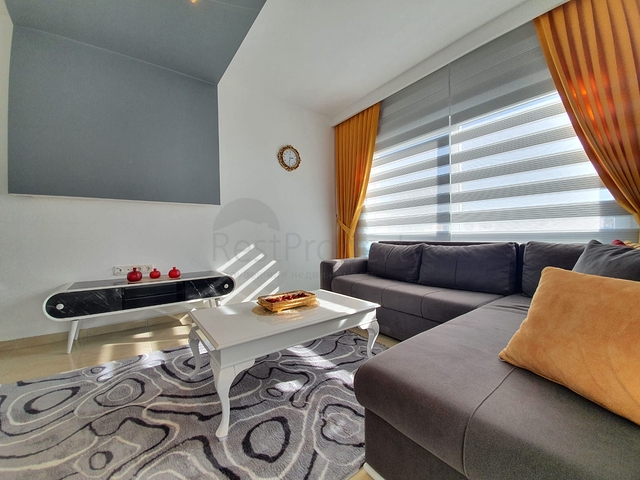 Меблированная квартира планировкой 1+1  в районе Махмутлар