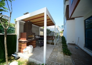 Меблированная квартира планировкой 1+1  в районе Махмутлар