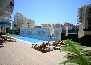 Меблированная квартира планировкой 1+1  в районе Махмутлар