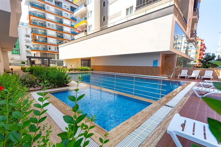 Пентхаус планировки 4+1 в 150 м от моря в районе Махмутлар