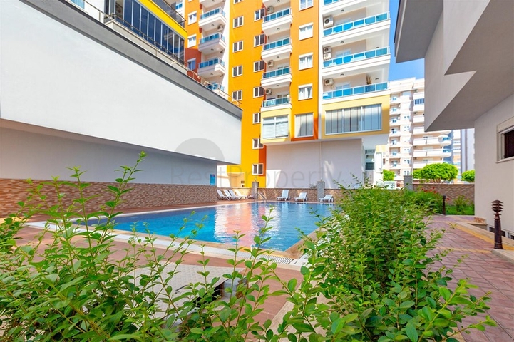 Пентхаус планировки 4+1 в 150 м от моря в районе Махмутлар