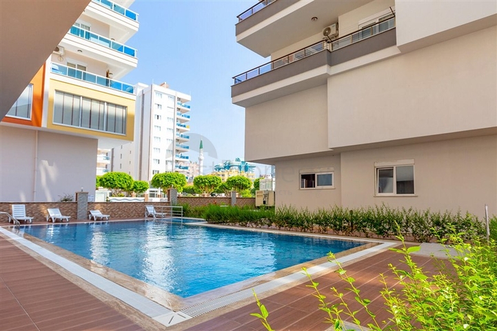 Пентхаус планировки 4+1 в 150 м от моря в районе Махмутлар