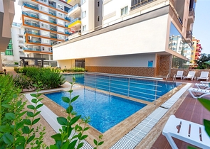 Пентхаус планировки 4+1 в 150 м от моря в районе Махмутлар