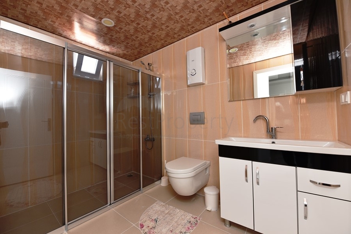 Пентхаус с тремя спальнями в Махмутларе