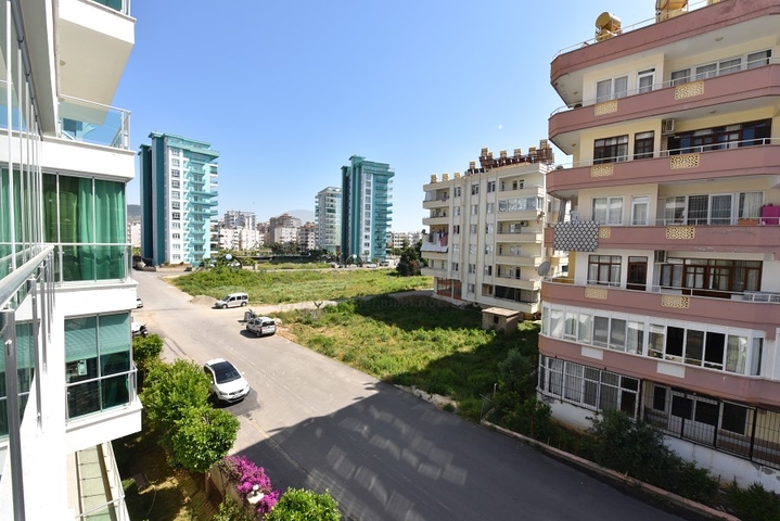 Квартира 2+1 с мебелью в районе Махмутлар с видом на горы