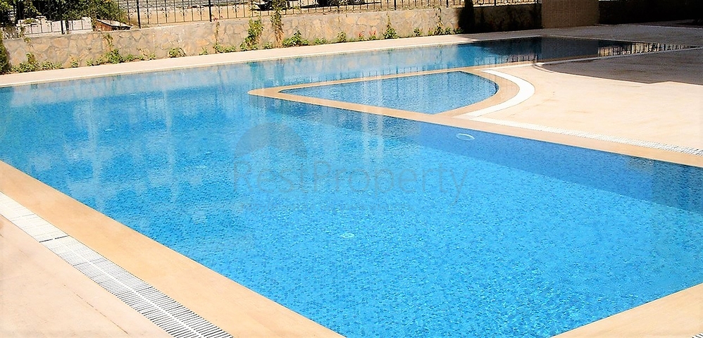 Трехкомнатная квартира в Махмутларе