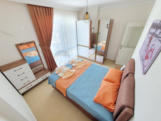 Меблированные апартаменты планировкой 2+1 в районе Махмутлар