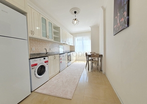 Меблированные апартаменты планировкой 2+1 в районе Махмутлар