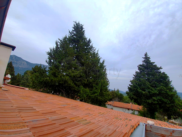 Загородный дом в горах в поселке Бейджик Кемер