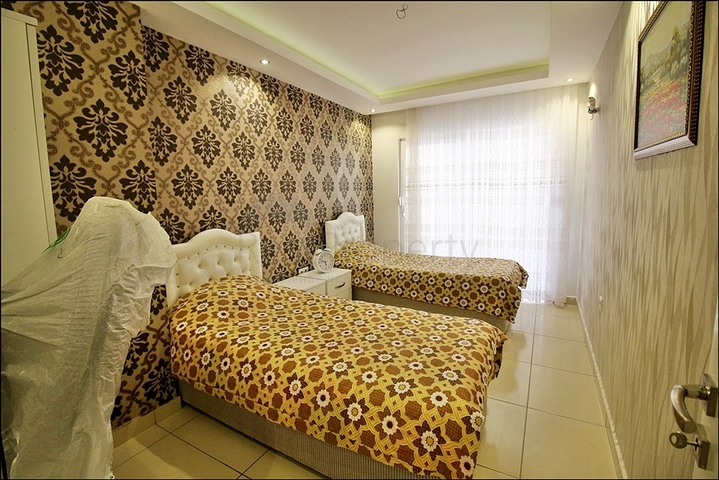 Меблированная трехкомнатная квартира в Махмутларе