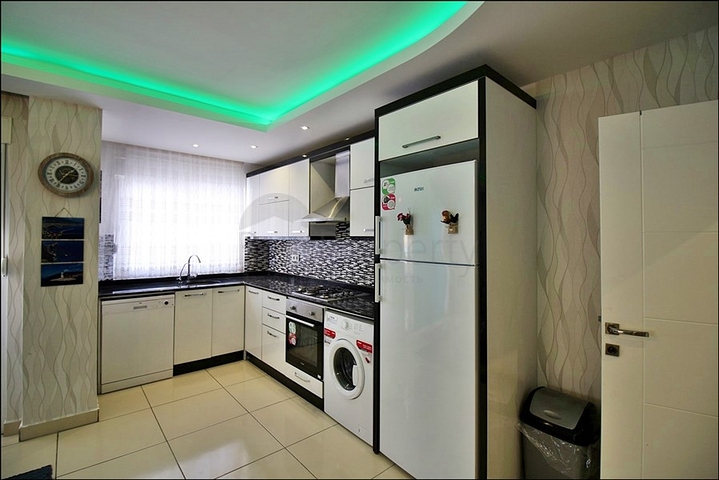 Меблированная трехкомнатная квартира в Махмутларе