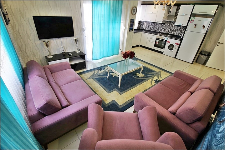 Меблированная трехкомнатная квартира в Махмутларе