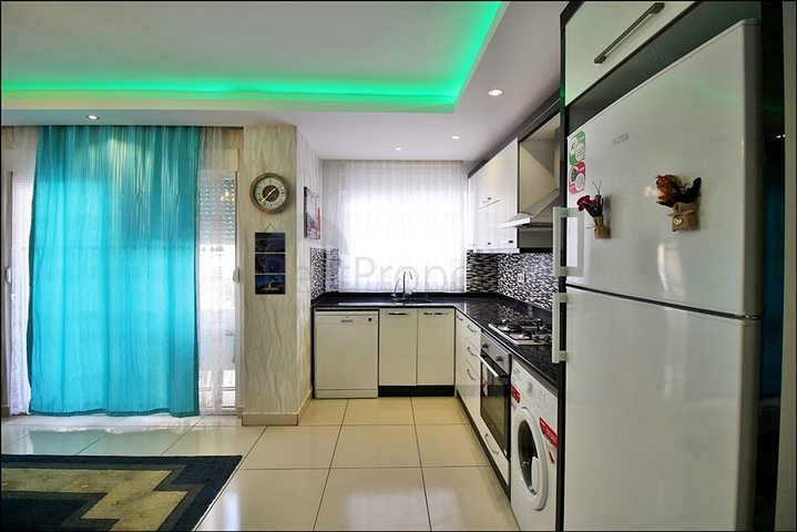 Меблированная трехкомнатная квартира в Махмутларе