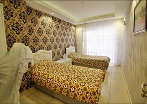 Меблированная трехкомнатная квартира в Махмутларе