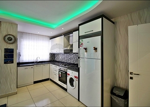 Меблированная трехкомнатная квартира в Махмутларе