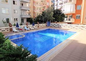 Меблированная трехкомнатная квартира в Махмутларе