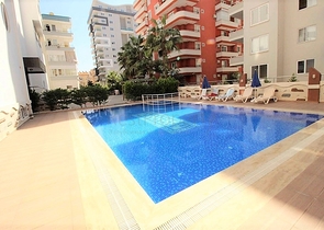 Меблированная трехкомнатная квартира в Махмутларе