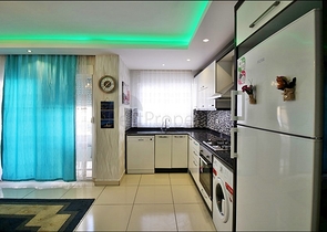 Меблированная трехкомнатная квартира в Махмутларе