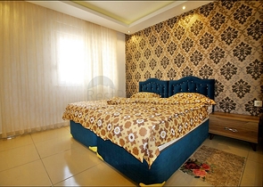 Меблированная трехкомнатная квартира в Махмутларе