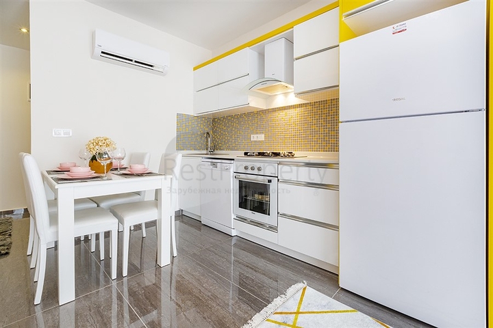 Меблированная двухкомнатная квартира в Махмутларе