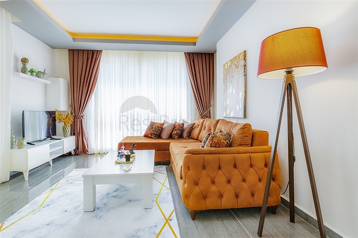 Меблированная двухкомнатная квартира в Махмутларе