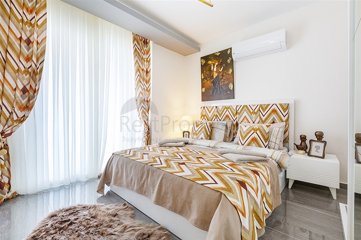 Меблированная двухкомнатная квартира в Махмутларе