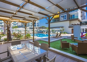 Меблированная двухкомнатная квартира в Махмутларе