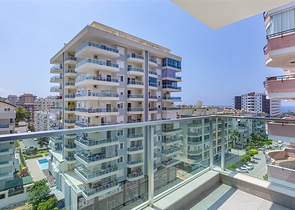 Меблированная двухкомнатная квартира в Махмутларе