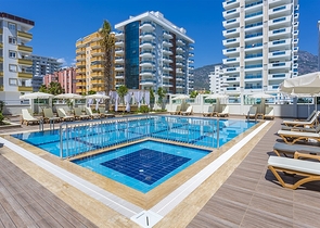 Меблированная двухкомнатная квартира в Махмутларе