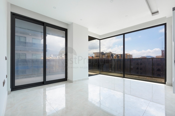 Апартаменты планировкой 2+1 в комплексе на первой береговой линии в Махмутлар