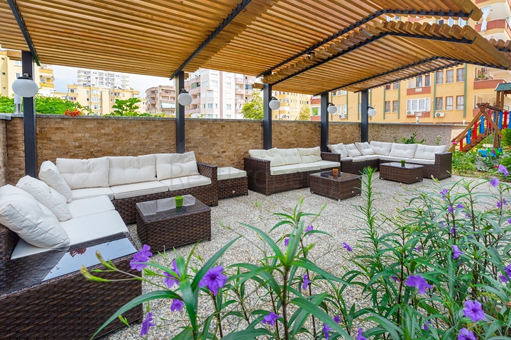 Апартаменты планировкой 2+1 в комплексе на первой береговой линии в Махмутлар