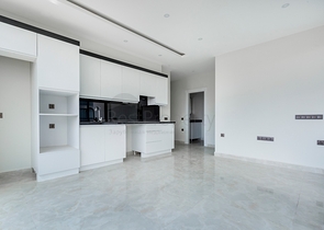 Апартаменты планировкой 2+1 в комплексе на первой береговой линии в Махмутлар