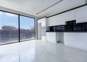 Апартаменты планировкой 2+1 в комплексе на первой береговой линии в Махмутлар