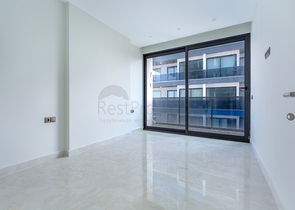 Апартаменты планировкой 2+1 в комплексе на первой береговой линии в Махмутлар