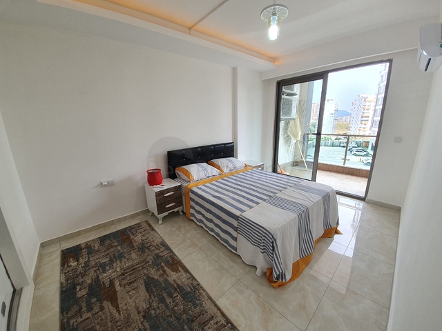 Двухкомнатная меблированная квартира в Махмутларе